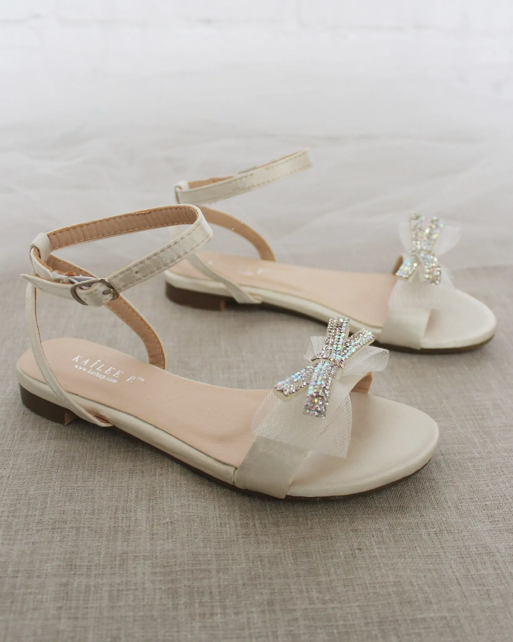 Ivory Satin Flat Sandal with Mini Mesh Rhinestones Bow and Ankle Strap