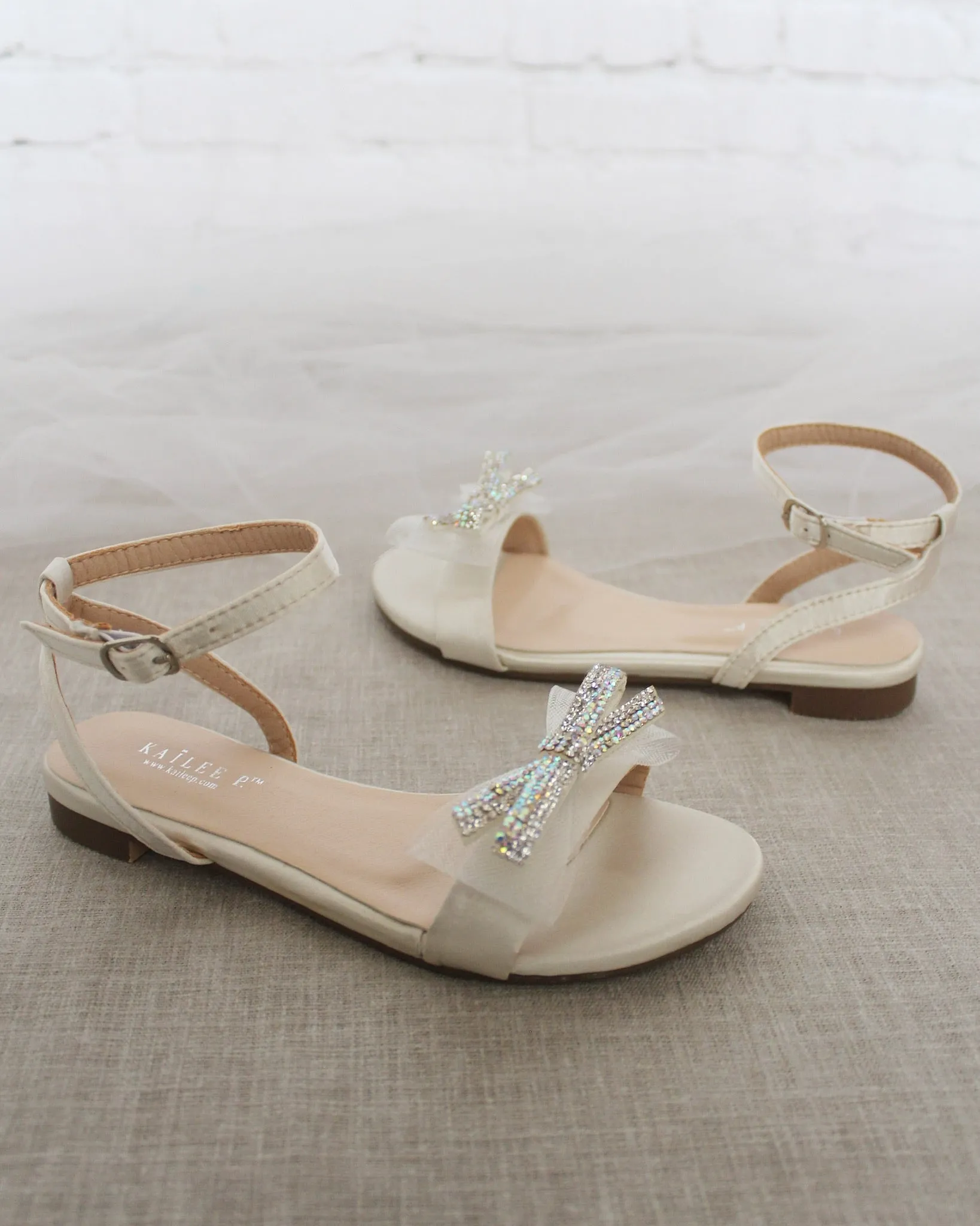 Ivory Satin Flat Sandal with Mini Mesh Rhinestones Bow and Ankle Strap