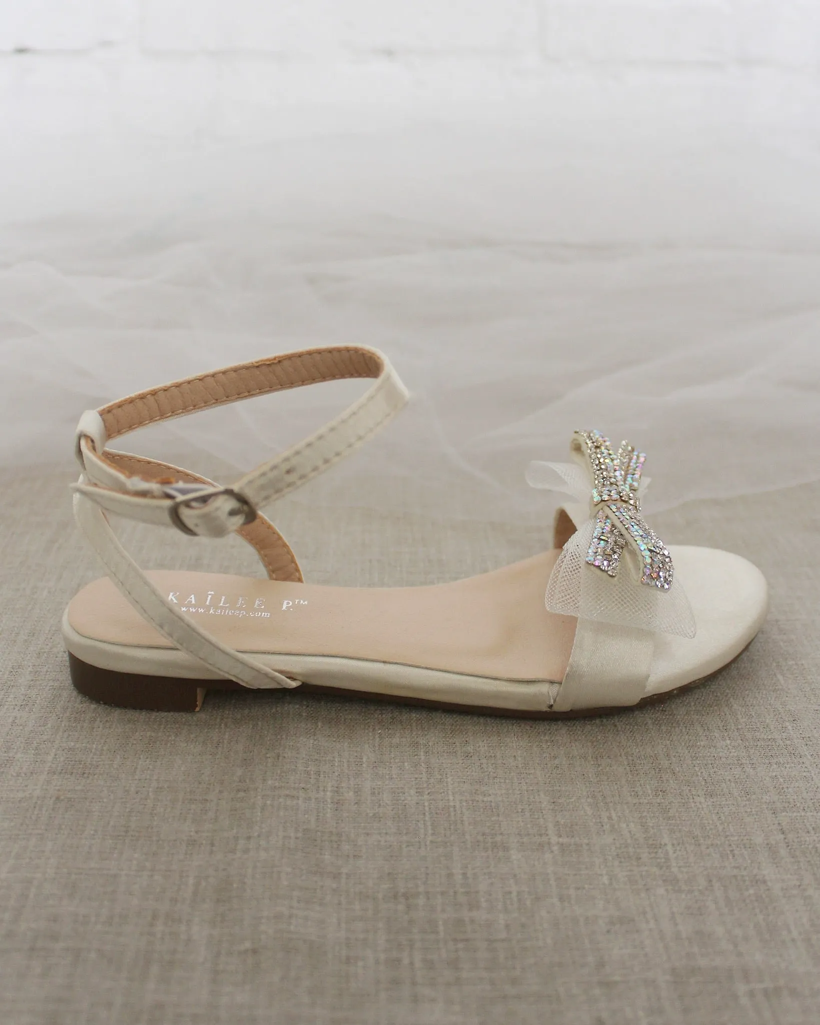 Ivory Satin Flat Sandal with Mini Mesh Rhinestones Bow and Ankle Strap